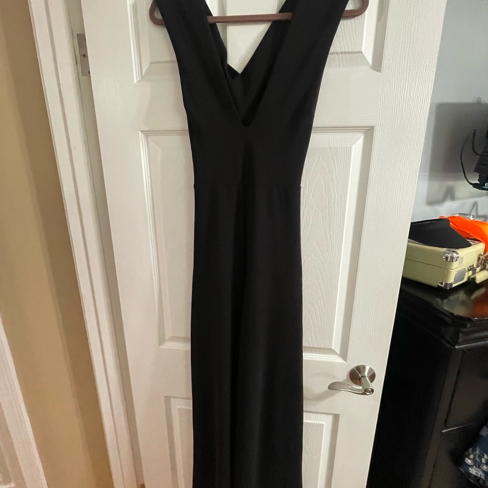 Lulu's Thinking Out Loud Black Backless Cross Strap V-Neck Sleeveless Jumpsuit